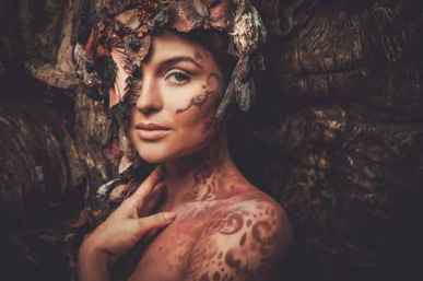 Nymph woman in a magical forest